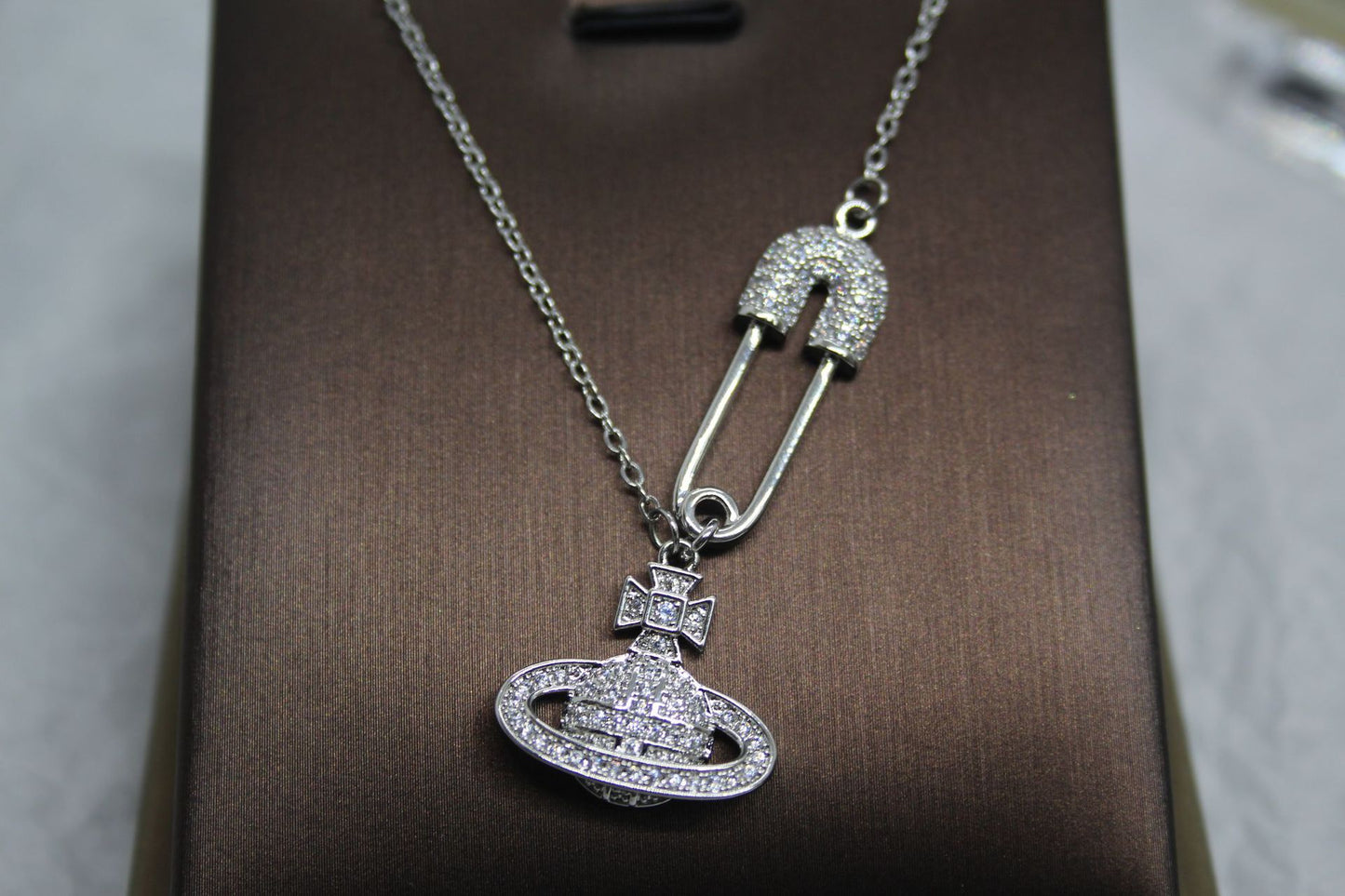 ASTRA® SATURN PENDANT NECKLACE